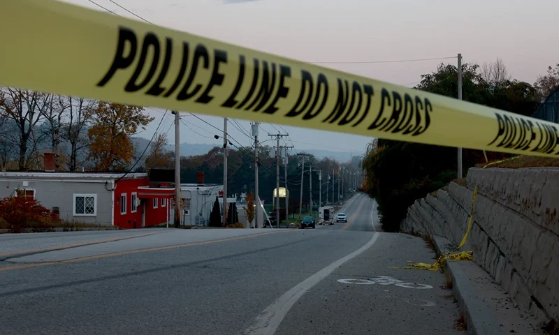 LEWISTON, MAINE - OCTOBER 27: Law Enforcement officials continue their investigation at the Schemengees Bar where one of two mass shootings took place on October 27, 2023 in Lewiston, Maine. Police are still searching for the suspect, Robert Card, who allegedly killed 18 people in two separate locations on Wednesday night. (Photo by Joe Raedle/Getty Images)