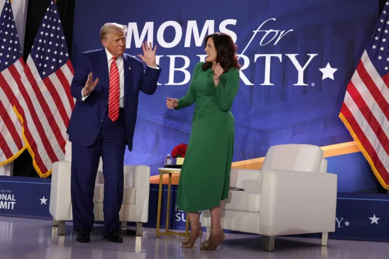 WASHINGTON, DC - AUGUST 30: Republican presidential nominee, former U.S. President Donald Trump (L) and Co-founder of Moms for Liberty Tiffany Justice (R) dance on the stage during the 2024 Joyful Warriors National Summit on August 30, 2024 in Washington, DC. Trump continued to campaign for the upcoming presidential election on November 5, 2024. (Photo by Alex Wong/Getty Images)