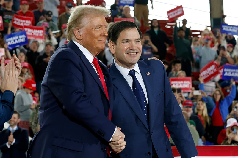 Republican presidential nominee, former U.S. President Donald Trump appears stage with U.S. Sen. Marco Rubio (R-FL) (R) and Arkansas Gov. Sarah Huckabee Sanders during a campaign rally at the J.S. Dorton Arena on November 04, 2024 in Raleigh, North Carolina. With one day left before the general election, Trump is campaigning for re-election in the battleground states of North Carolina, Pennsylvania and Michigan. (Photo by Chip Somodevilla/Getty Images)