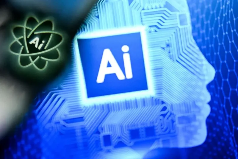 A photo taken on January 2, 2025 shows the letters AI for Artificial Intelligence on a laptop screen (R) next to the logo of the Chat AI application on a smartphone screen in Frankfurt am Main, western Germany. (Photo by Kirill KUDRYAVTSEV / AFP) (Photo by KIRILL KUDRYAVTSEV/AFP via Getty Images)