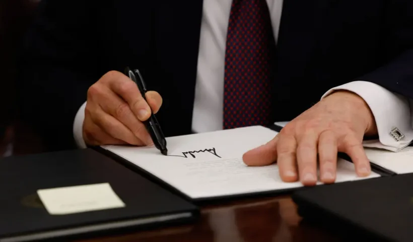WASHINGTON, DC - JANUARY 20: President Donald Trump signs executive orders in the Oval Office on January 20, 2025 in Washington, DC. Trump takes office for his second term as the 47th president of the United States. (Photo by Anna Moneymaker/Getty Images)