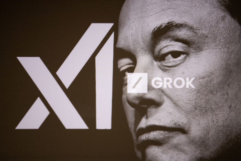 Double exposure photograph of a portrait of elon musk and a telephone displaying the grok artificial intelligence logo in Kerlouan in Brittany in France on February 18 2025. (Photo by Vincent Feuray / Hans Lucas / Hans Lucas via AFP) (Photo by VINCENT FEURAY/Hans Lucas/AFP via Getty Images)