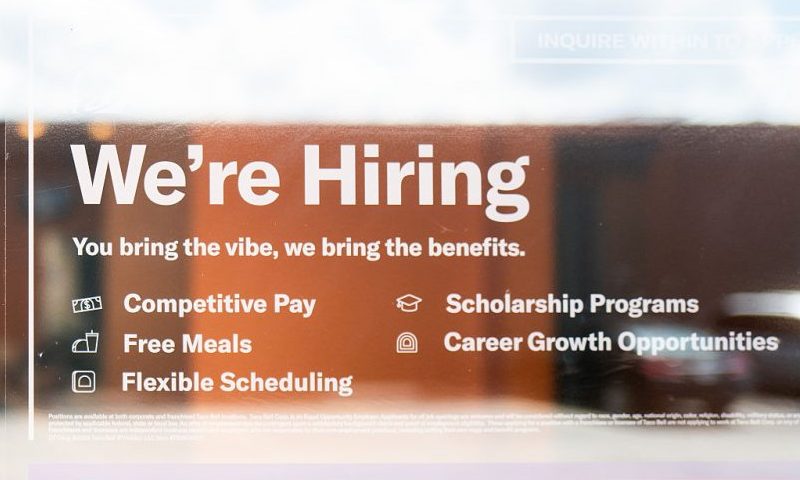AUSTIN, TEXAS - JUNE 25: A hiring sign is displayed in a Taco Bell window on June 25, 2025 in Austin, Texas. The Texas labor market has set a new record high job count for its sixth consecutive month in a row by adding 28,100 positions over the month of May to reach a total of 14,340,800 non-farm jobs according to the Texas Workforce Commission. (Photo by Brandon Bell/Getty Images)