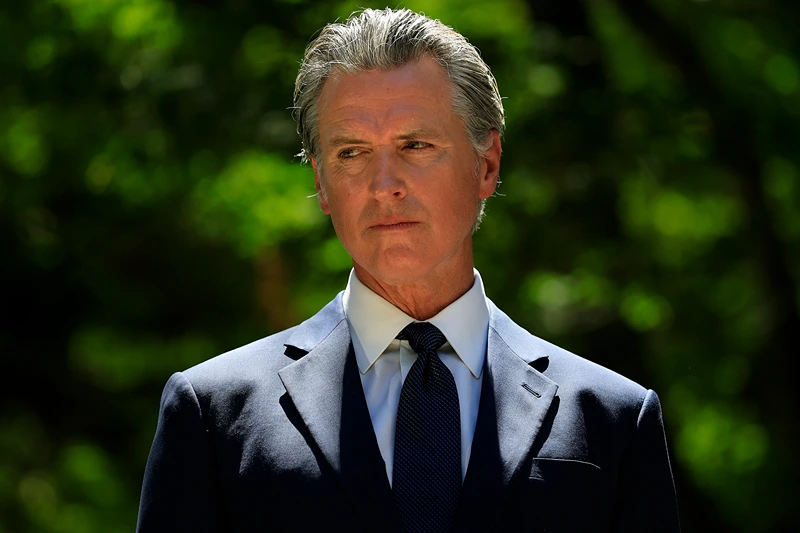 SACRAMENTO, CALIFORNIA - JULY 25: California Gov. Gavin Newsom looks on during a news conference with Texas lawmakers at the Governor’s Mansion on July 25, 2025 in Sacramento, California. California Gov. Gavin Newsom met with Texas lawmakers to push back on Texas's redistricting maneuver that aims to tilt the outcome of the 2026 midterm elections and on how California plans to respond. (Photo by Justin Sullivan/Getty Images)