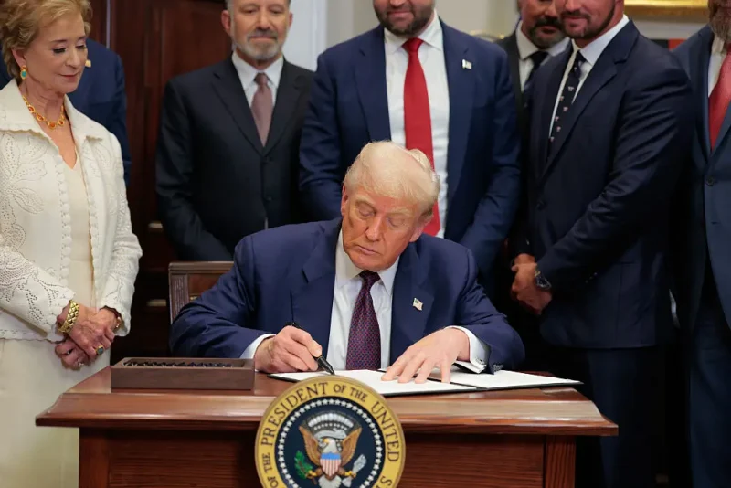 WASHINGTON, DC - JULY 31: U.S. President Donald Trump signs an executive order in the Roosevelt Room of the White House on July 31, 2025 in Washington, DC. Trump signed a series of orders that will expand on his council on sports, fitness and nutrition, including by reviving the Presidential Fitness Test in public schools. (Photo by Anna Moneymaker/Getty Images)