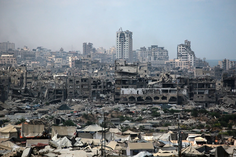Tents used as temporary shelters by displaced Palestinians are set up near war-damaged buildings in Gaza City on August 8, 2025. Israel's military will "take control" of Gaza City under a plan proposed by Prime Minister Benjamin Netanyahu and approved by his security cabinet, triggered a wave of criticism from across the world. (Photo by Bashar TALEB / AFP) (Photo by BASHAR TALEB/AFP via Getty Images)