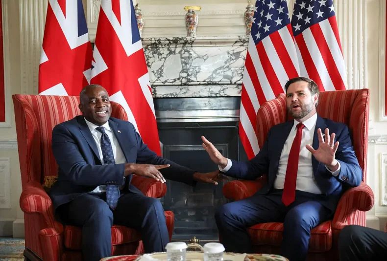 SEVENOAKS, ENGLAND - AUGUST 8: U.S. Vice President JD Vance speaks with British Foreign Secretary David Lammy during a meeting at Chevening House on August 8, 2025 in Sevenoaks, England. US Vice President JD Vance and UK Foreign Secretary David Lammy are meeting for an official bilateral discussion at Chevening House, the Foreign Secretary's Grade I-listed summer residence near Sevenoaks in Kent, where Lammy is hosting the Vance family for the start of their UK holiday. Vance's itinerary is expected to also include a stay in the Cotswolds and a visit to Hampton Court Palace, and comes just weeks after US President Donald Trump vacationed in Scotland. (Photo by Suzanne Plunkett - WPA Pool/Getty Images)
