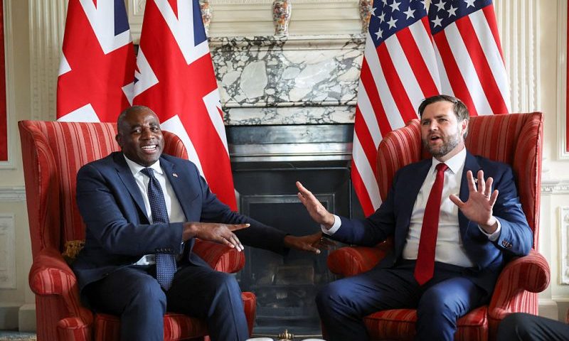 SEVENOAKS, ENGLAND - AUGUST 8: U.S. Vice President JD Vance speaks with British Foreign Secretary David Lammy during a meeting at Chevening House on August 8, 2025 in Sevenoaks, England. US Vice President JD Vance and UK Foreign Secretary David Lammy are meeting for an official bilateral discussion at Chevening House, the Foreign Secretary's Grade I-listed summer residence near Sevenoaks in Kent, where Lammy is hosting the Vance family for the start of their UK holiday. Vance's itinerary is expected to also include a stay in the Cotswolds and a visit to Hampton Court Palace, and comes just weeks after US President Donald Trump vacationed in Scotland. (Photo by Suzanne Plunkett - WPA Pool/Getty Images)