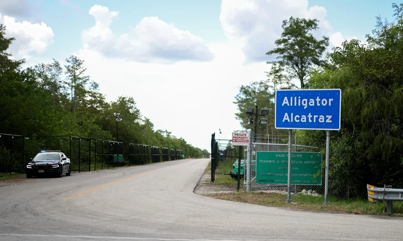 OCHOPEE, FLORIDA - AUGUST 03: The entrance to the state-managed immigration detention center dubbed Alligator Alcatraz, located at the Dade-Collier Training and Transition Airport in the Florida Everglades on August 03, 2025 in Ochopee, Florida. Faith leaders led prayer for those being held within the facility. (Photo by Joe Raedle/Getty Images)