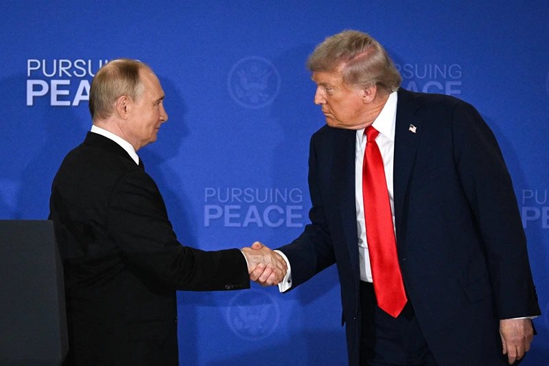 US President Donald Trump (R) and Russian President Vladimir Putin shake hands at the end of a joint press conference after participating in a US-Russia summit on Ukraine at Joint Base Elmendorf-Richardson in Anchorage, Alaska, on August 15, 2025. (Photo by Drew ANGERER / AFP) (Photo by DREW ANGERER/AFP via Getty Images)