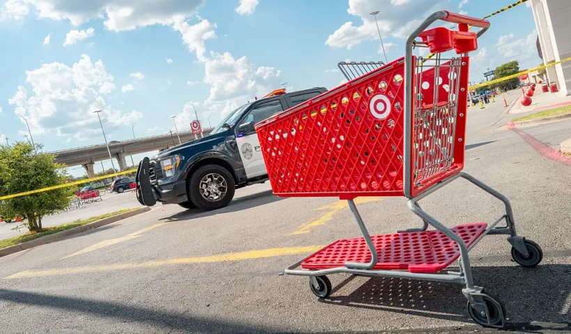 AUSTIN, TEXAS - AUGUST 11: An empty Target basket is seen near the grounds of a Target store on August 11, 2025 in Austin, Texas. 3 people have died after a gunman opened fire in the parking lot of a Target store in North Austin. The suspect has been arrested after being found by police in South Austin. (Photo by Brandon Bell/Getty Images)