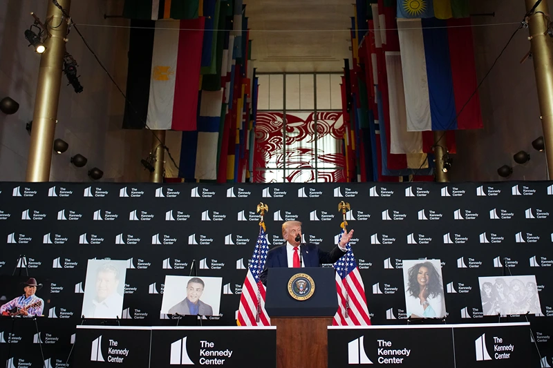 U.S. President Donald Trump (C) announces nominees for the annual Kennedy Center Honors (L-R) Country music artist George Strait, actor Michael Crawford, actor Sylvester Stallone, singer Gloria Gaynor and members of the rock band Kiss during an event at the Kennedy Center on August 13, 2025 in Washington, DC. Trump is expected to announce the first nominees of the annual Kennedy Center Honors since taking control of the center’s board earlier this year. (Photo by Andrew Harnik/Getty Images)