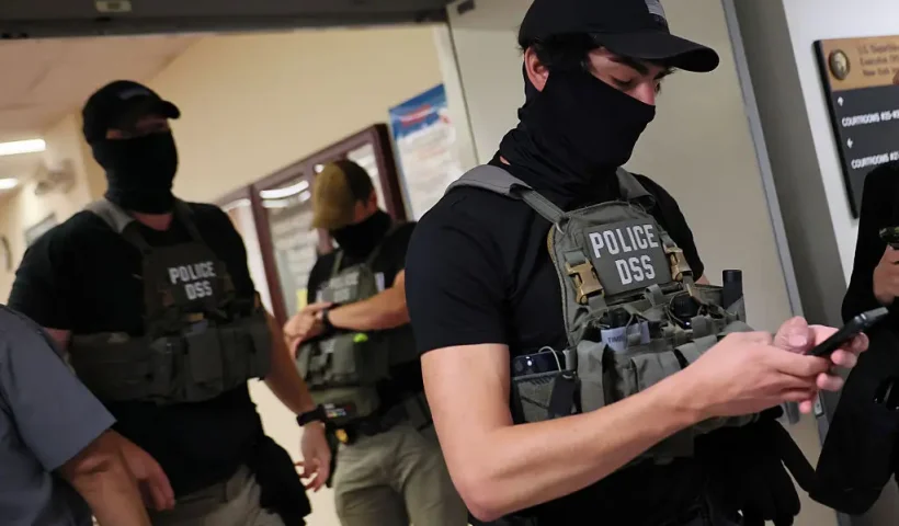 NEW YORK, NEW YORK - AUGUST 14: Federal agents patrol the halls of immigration court at the Jacob K. Javitz Federal Building on August 14, 2025 in New York City. A federal judge ordered the Trump administration and Immigration and Customs Enforcement (ICE) to hold fewer people on the 10th floor holding cells in 26 Federal Plaza where detainees have complained of squalid and overcrowded conditions. The judge also gave an order to allow migrants to call to their lawyers and have access to proper medical and hygienic care. The ruling came after a lawsuit was filed by by legal organizations representing a Peruvian immigrant, Sergio Alberto Barco Mercado who was arrested by ICE and held at 26 Federal Plaza last week. (Photo by Michael M. Santiago/Getty Images)
