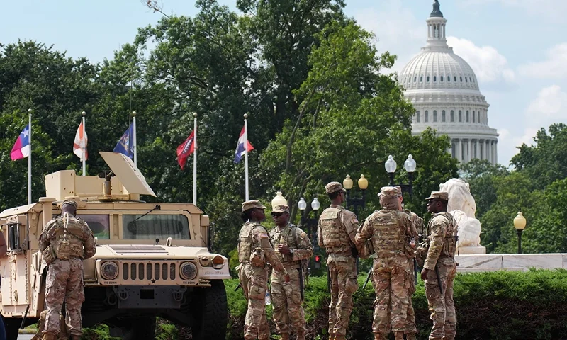WASHINGTON, DC - AUGUST 14: Members of the National Guard stand by at Union Station on August 14, 2025 in Washington, DC. President Donald Trump announced plans to deploy federal officers and the National Guard to the District in order to place the DC Metropolitan Police Department under federal control and assist in crime prevention in the nation's capital. (Photo by Kevin Dietsch/Getty Images)
