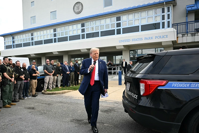 US President Donald Trump speaks while visiting federal troops at the US Park Police Anacostia operations facility in Washington, DC, on August 21, 2025. Trump said he plans to patrol Washington's streets on Thursday with troops he deployed to the US capital in a show of force against what he claims is a "crime emergency." Trump ordered hundreds of National Guard to deploy in Washington last week vowing to "take our capital back," despite protests by some residents and statistics showing violent offenses falling. (Photo by Mandel NGAN / AFP) (Photo by MANDEL NGAN/AFP via Getty Images)