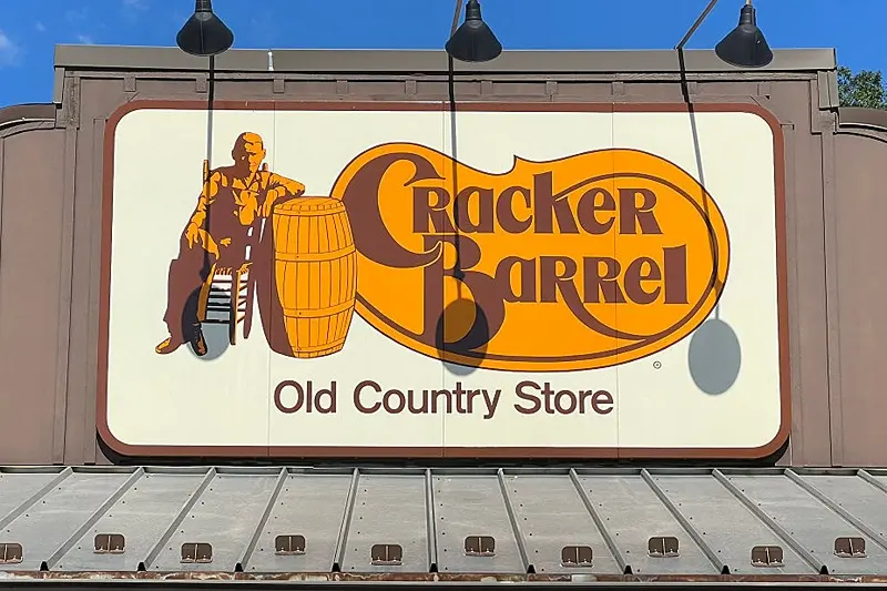 The Cracker Barrel Old Country Store logo is displayed on a large rooftop sign in Mount Arlington, New Jersey, on August 22, 2025. Cracker Barrel has a special place in the hearts of many Americans, offering country cuisine in a folksy "Old Country Store" setting complete with rocking chairs and occasional country music performances. But an attempt to rebrand the storied US chain has sparked a firestorm of opposition online and opened a new front in the culture wars around legacy brands seeking to update their corporate images (Photo by Gregory WALTON / AFP) (Photo by GREGORY WALTON/AFP via Getty Images)