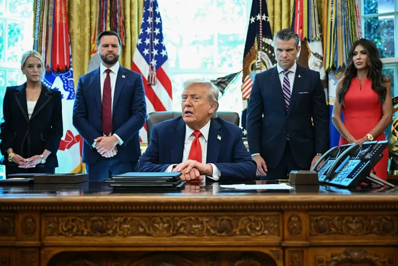 L/R, US Attorney General Pam Bondi, Vice President JD Vance, Defense Secretary Pete Hegseth and Secretary of Homeland Security Kristi Noem look on as US President Donald Trump speaks to the press before signing an executive order that aims to end cashless bail, in the Oval Office of the White House in Washington, DC on August 25, 2025. (Photo by Mandel NGAN / AFP) (Photo by MANDEL NGAN/AFP via Getty Images)