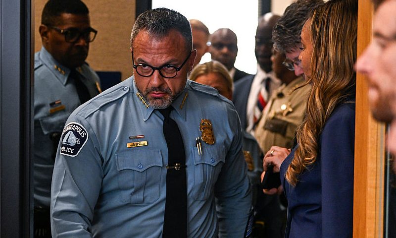 MINNEAPOLIS, MINNESOTA - AUGUST 28: Minneapolis Police Chief Brian O'Hara (C) arrives at a law enforcement briefing following a mass shooting at Annunciation Catholic School on August 28, 2025 in Minneapolis, Minnesota. According to Minneapolis Police, a gunman fired through the windows of the Annunciation Church at worshippers sitting in pews during a Catholic school Mass, killing two children and injuring at least 17 others. The gunman reportedly died at the scene from a self-inflicted gunshot wound. (Photo by Stephen Maturen/Getty Images)