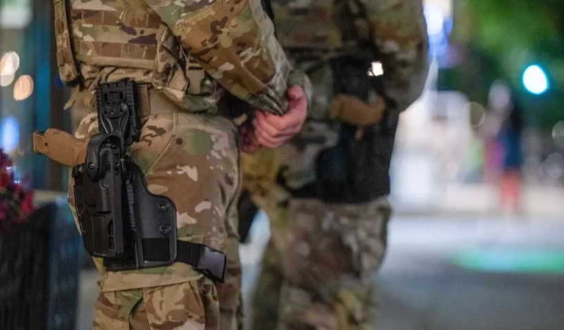 WASHINGTON, DC - AUGUST 24: National Guard Members patrol 14th street, working with Washington DC Metro police on August 24, 2025 in Washington, DC. An increased presence of law enforcement has been seen throughout the nation's capital since U.S. President Donald Trump ordered in federal officers and the U.S. National Guard. (Photo by Tasos Katopodis/Getty Images)