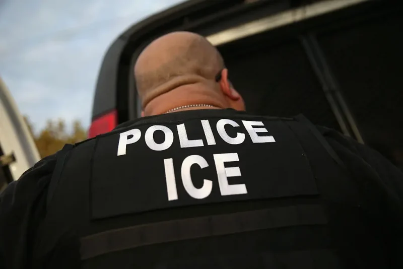 LOS ANGELES, CA - OCTOBER 14: U.S. Immigration and Customs Enforcement (ICE), agents detain an immigrant on October 14, 2015 in Los Angeles, California. ICE agents said the immigrant, a legal resident with a Green Card, was a convicted criminal and member of the Alabama Street Gang in the Canoga Park area. ICE builds deportation cases against thousands of immigrants living in the United States. Green Card holders are also vulnerable to deportation if convicted of certain crimes. The number of ICE detentions and deportations from California has dropped since the state passed the Trust Act in October 2013, which set limits on California state law enforcement cooperation with federal immigration authorities. (Photo by John Moore/Getty Images)