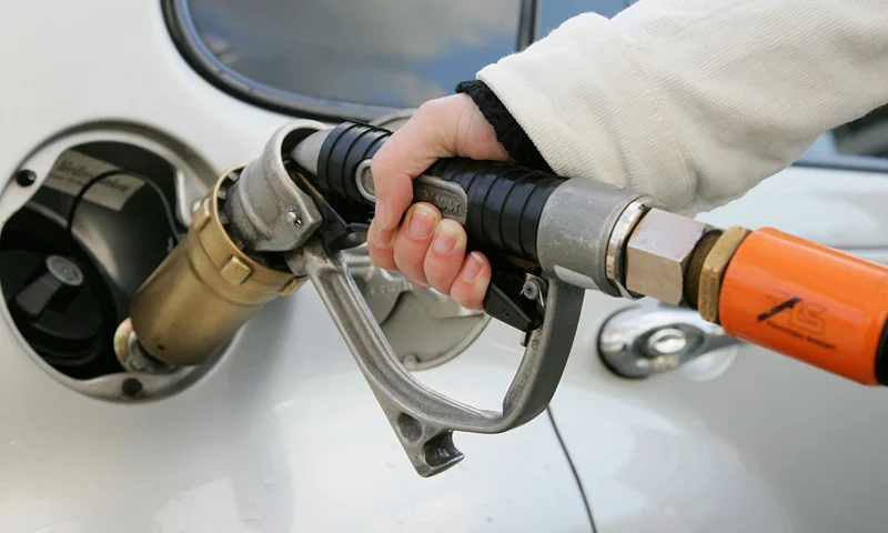 : A woman fills up a gas-tank of a car at a gas filling station on March 19, 2007 in Berlin, Germany. Autogas is the common name for liquified petroleum gas when it is used as a fuel in internal combustion engines in vehicles. Autogas is widely used as a "green" fuel as it decreases exhaust emissions (less 20 percent CO2) (Photo by Andreas Rentz/Getty Images)