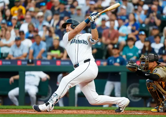 Seattle Mariners catcher Cal Raleigh (29) hits a solo-home run against the San Diego Padres during the first inning at T-Mobile Park. The home run is the 50th of the season for Raleigh. Mandatory Credit: Joe Nicholson-Imagn Images