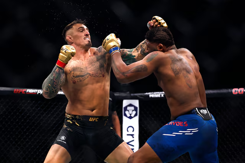 Mixed Martial Arts - UFC 304 - Manchester - Co-op Live, Manchester, Britain - July 28, 2024. Tom Aspinall fights Curtis Blaydes during UFC 304. REUTERS/John Sibley/File Photo