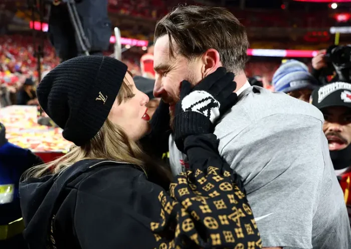 Taylor Swift and Kansas City Chiefs tight end Travis Kelce (87) react after the AFC Championship game against the Buffalo Bills at GEHA Field at Arrowhead Stadium. Mandatory Credit: Mark J. Rebilas-Imagn Images/File Photo