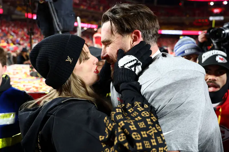 Taylor Swift and Kansas City Chiefs tight end Travis Kelce (87) react after the AFC Championship game against the Buffalo Bills at GEHA Field at Arrowhead Stadium. Mandatory Credit: Mark J. Rebilas-Imagn Images/File Photo