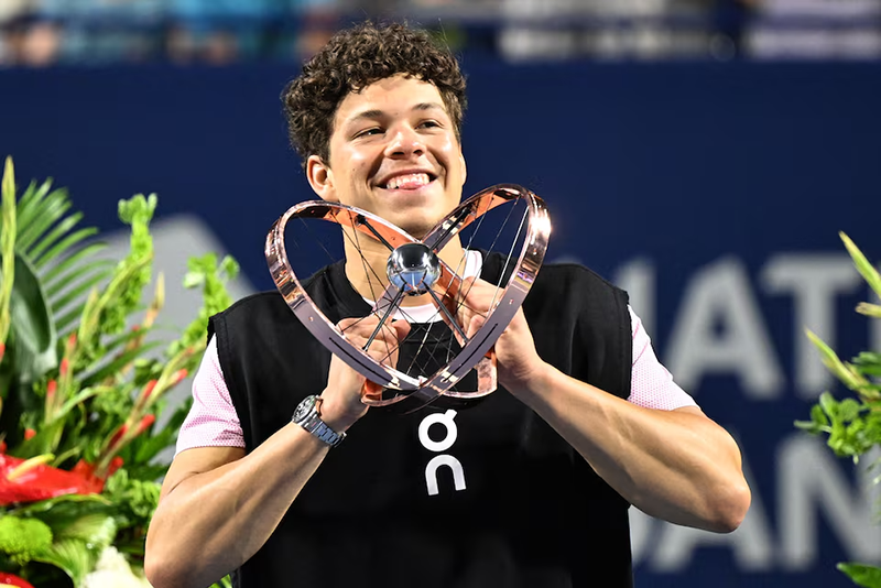 Ben Shelton (USA) lifts the winners trophy after defeating Karen Khachanov during the singles final at Sobeys Stadium. Mandatory Credit: Dan Hamilton-Imagn Images