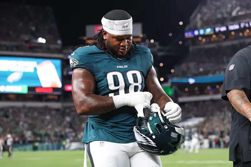 Philadelphia Eagles defensive tackle Jalen Carter (98) walks off the field after being ejected during the first quarter of the game against the Dallas Cowboys at Lincoln Financial Field. Mandatory Credit: Bill Streicher-Imagn Images