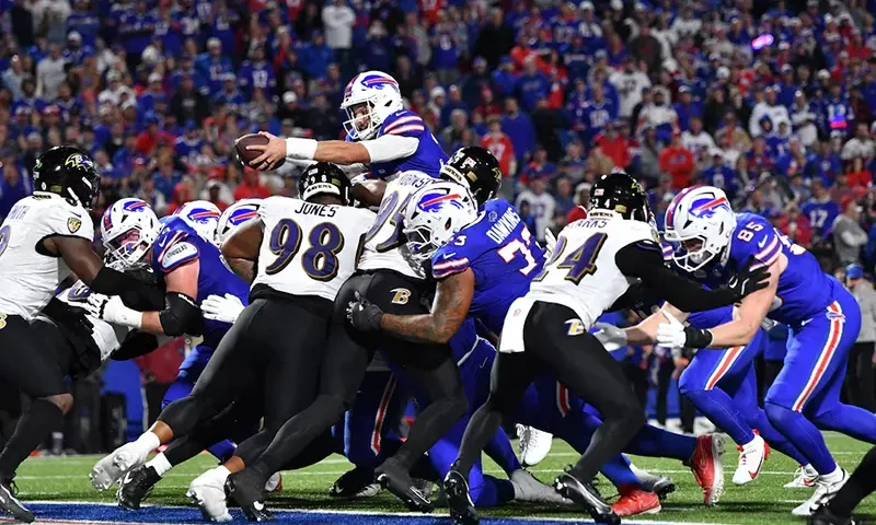 Buffalo Bills quarterback Josh Allen (17) score a touchdown during the fourth quarter against the Baltimore Ravens at Highmark Stadium. Mandatory Credit: Mark Konezny-Imagn Images