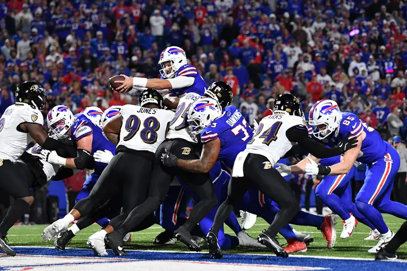 Buffalo Bills quarterback Josh Allen (17) score a touchdown during the fourth quarter against the Baltimore Ravens at Highmark Stadium. Mandatory Credit: Mark Konezny-Imagn Images