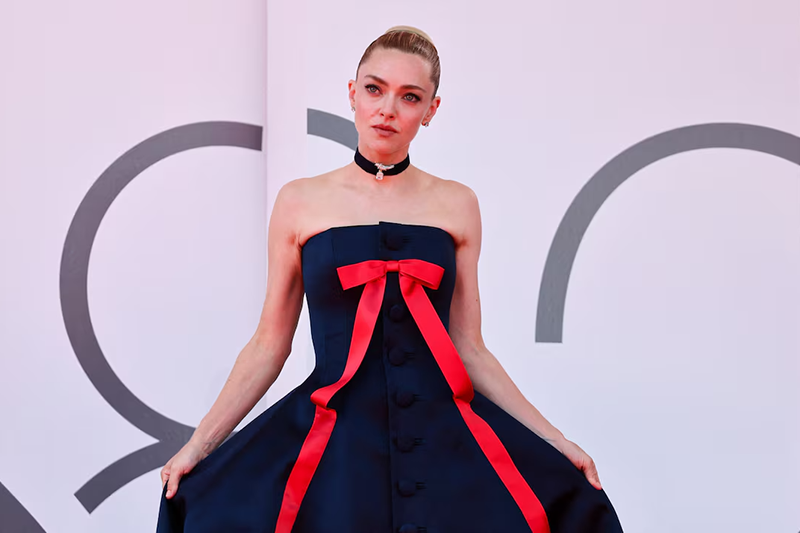 Cast member Amanda Seyfried poses on the red carpet during arrivals for the screening "The Testament of Ann Lee" in competition, at the 82nd Venice Film Festival, Venice, Italy, September 1, 2025. REUTERS/Yara Nardi