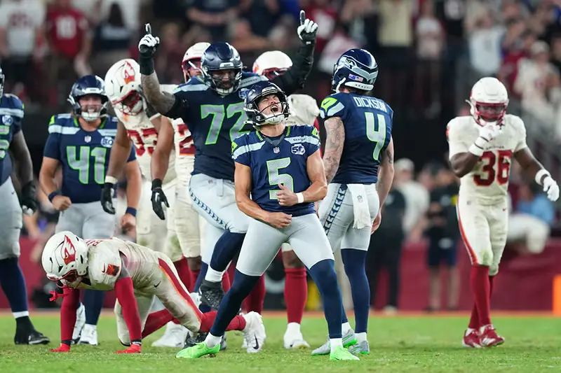 Seattle Seahawks place kicker Jason Myers (5) celebrates after kicking a game-winning field goal against the Arizona Cardinals at State Farm Stadium. Mandatory Credit: Joe Camporeale-Imagn Images