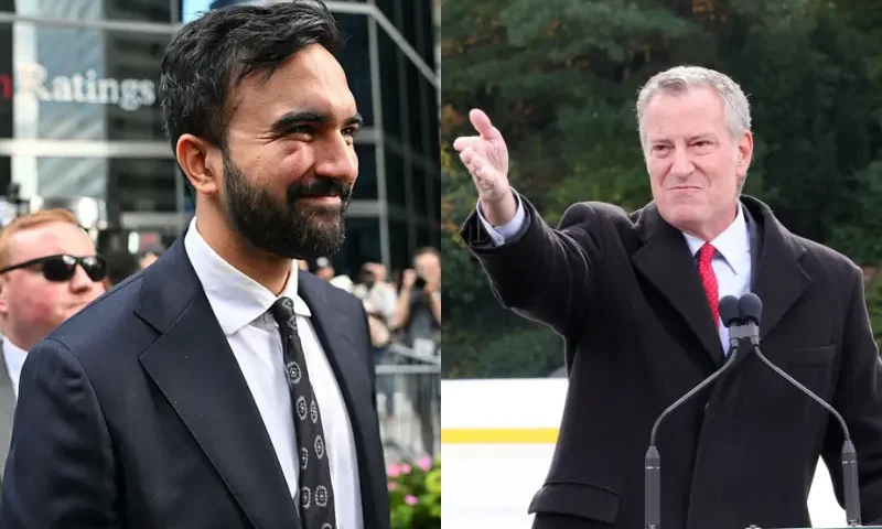 New York City Mayoral candidate Zohran Mamdani departs after speaking during a "March on Wall Street" to call for economic justice on August 28, 2025, in New York City. (Photo by ANGELA WEISS / AFP) (Photo by ANGELA WEISS/AFP via Getty Images) / Mayor Bill De Blasio speaks at the Grand Reopening of Wollman Rink NYC in Central Park on November 14, 2021 in New York City. Wollman Rink NYC is operated by Wollman Park Partners. (Photo by Cindy Ord/Getty Images for Wollman Rink NYC)