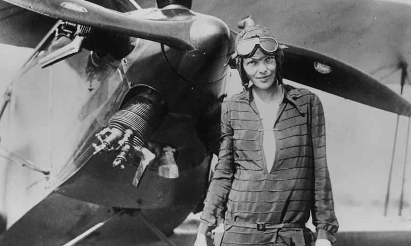 394033 03: (FILE PHOTO) Amelia Earhart stands June 14, 1928 in front of her bi-plane called "Friendship" in Newfoundland. Carlene Mendieta, who is trying to recreate Earhart's 1928 record as the first woman to fly across the US and back again, left Rye, NY on September 5, 2001. Earhart (1898 - 1937) disappeared without trace over the Pacific Ocean in her attempt to fly around the world in 1937. (Photo by Getty Images)