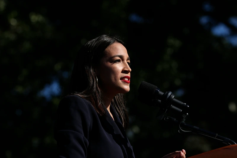 NEW YORK, NY - OCTOBER 19: Rep. Alexandria Ocasio-Cortez (D-NY) endorses Democratic presidential candidate, Sen. Bernie Sanders (I-VT) at a campaign rally in Queensbridge Park on October 19, 2019 in the Queens borough of New York City. This is Sanders' first rally since he paused his campaign for the nomination due to health problems. (Photo by Kena Betancur/Getty Images)