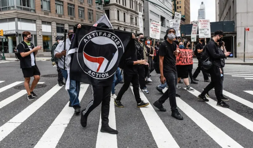 NEW YORK, NY - JULY 25: Left wing protesters, some affiliated with Antifa, hold a counter protest against right wing protesters participating in a political rally on July 25, 2021 in New York City. Right wing protesters were demanding a release of the people who were arrested on January 6th for their involvement in the breach of the Capitol building. (Photo by Stephanie Keith/Getty Images)
