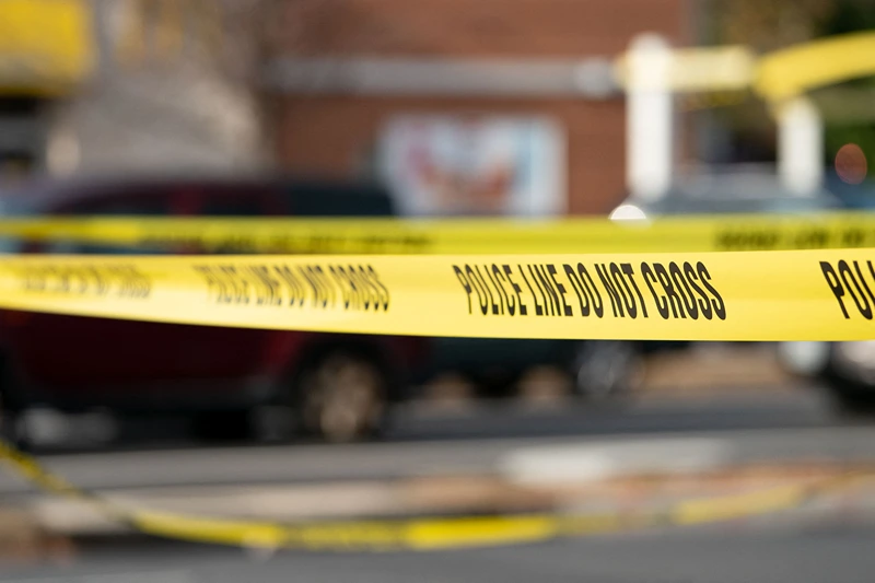 Police tape surrounds the area near a home that exploded in Arlington, Virginia, on December 4 and rocked a neighborhood with a powerful blast, on December 5, 2023. Three police officers received minor injuries but were not taken to hospitals, the department said. Officials are unaware of anyone else who was hurt, they said at a news conference. (Photo by Stefani Reynolds / AFP) (Photo by STEFANI REYNOLDS/AFP via Getty Images)