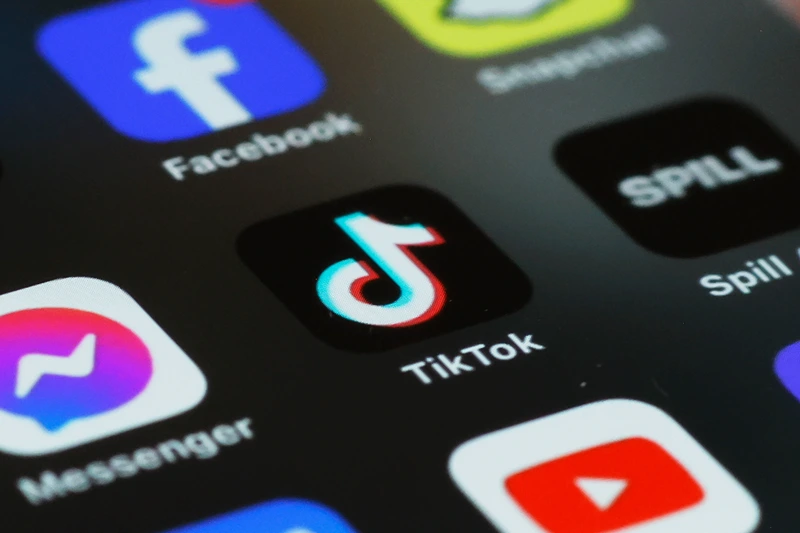 NEW YORK, NEW YORK - MARCH 13: In this photo illustration, the TikTok app is seen on a phone on March 13, 2024 in New York City. Congress is set to vote and pass a bill that could ban the popular app TikTok nationwide and be sent to the Senate for a vote. The bill would force the Chinese firm ByteDance to divest from TikTok and other applications that it owns within six months after passage of the bill or face a ban. Lawmakers argue that ByteDance is beholden to the Chinese government making the app a national security threat. (Photo Illustration by Michael M. Santiago/Getty Images)