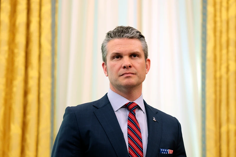 WASHINGTON, DC - MARCH 21: U.S. Secretary of Defense Peter Hegseth listens as U.S. President Donald Trump delivers remarks in the Oval Office of the White House on March 21, 2025 in Washington, DC. Trump announced the Next Generation of Air Dominance (NGDA) program, the F-47, the sixth-generation high-tech Air Force fighter to succeed the F-22 Raptor. (Photo by Anna Moneymaker/Getty Images)