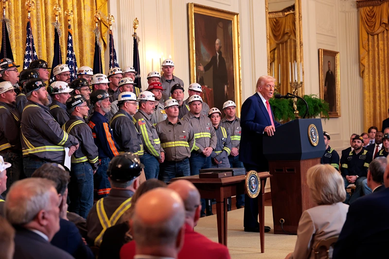 WASHINGTON, DC - APRIL 08: U.S. President Donald Trump speaks alongside coal and energy workers during an executive order signing ceremony in the East Room of the White House on April 08, 2025 in Washington, DC. The Trump administration has elected to roll back Biden-era environmental policies with the intention to help revive coal-fired plants in order to restore America’s energy independence. (Photo by Anna Moneymaker/Getty Images)