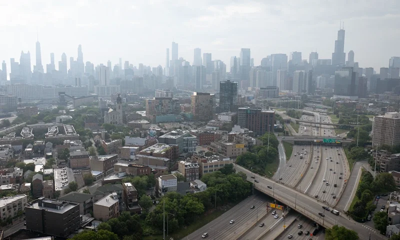 CHICAGO, ILLINOIS - JUNE 06: An aerial view shows smoke from Canadian wildfires dimming the city's skyline on June 06, 2025 in Chicago, Illinois. The city has been under an air quality alert for the past two days, with vulnerable residents encouraged to limit their time outdoors. (Photo by Scott Olson/Getty Images)