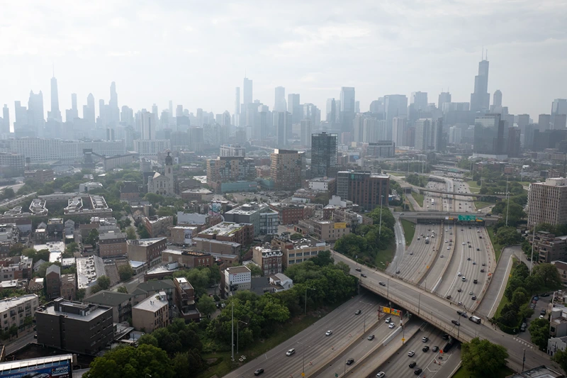 CHICAGO, ILLINOIS - JUNE 06: An aerial view shows smoke from Canadian wildfires dimming the city's skyline on June 06, 2025 in Chicago, Illinois. The city has been under an air quality alert for the past two days, with vulnerable residents encouraged to limit their time outdoors. (Photo by Scott Olson/Getty Images)