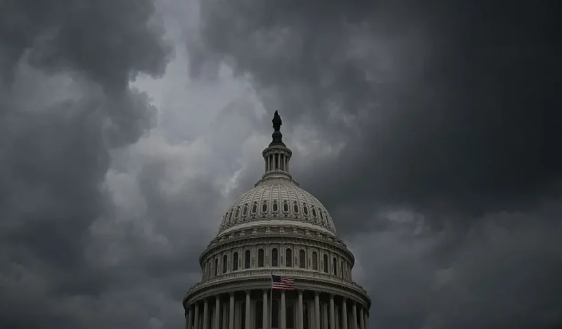 A view of the US Capitol after the Senate passed the "Big Beautiful Bill Act" earlier in the day in Washington, DC, on July 1, 2025. The Republican-led US Senate approved President Donald Trump's mammoth domestic policy bill July 1, 2024 by the narrowest of margins, despite misgivings over delivering deep welfare cuts and another $3 trillion in national debt. Republican leaders had struggled to corral support during a record 24-hour "vote-a-rama" amendment session on the Senate floor, as Democrats offered dozens of challenges to the most divisive aspects of the package. (Photo by Drew ANGERER / AFP) (Photo by DREW ANGERER/AFP via Getty Images)