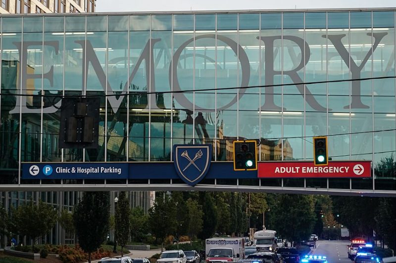 ATLANTA, GEORGIA - AUGUST 08: Law enforcement vehicles are seen outside Emory Hospital following an active shooter incident on August 8, 2025 in Atlanta, Georgia. According to the Atlanta Police Department, the suspect in the active shooter situation is dead and a police officer was injured. (Photo by Elijah Nouvelage/Getty Images)