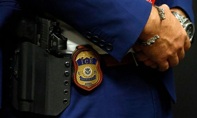 ARLINGTON, TEXAS - AUGUST 26: A detail view of the badge worn by Matthew Elliston, deputy assistant director of field operations at ICE headquarters in Washington. U.S. Immigration and Customs Enforcement (ICE) hold a major hiring event on August 26, 2025 in Arlington, Texas. The federal immigration agency is ramping up recruiting efforts nationwide. (Photo by Ron Jenkins/Getty Images)
