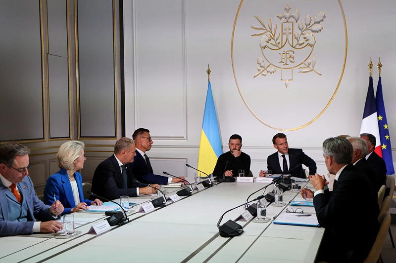 (From front L to front R) Belgium's Prime Minister Bart De Wever, European Commission President Ursula Von der Leyen, Poland's Prime Minister Donald Tusk, Finland's President Alexander Stubb, Ukraine's President Volodymyr Zelensky, France's President Emmanuel Macron, White House Special Envoy Steve Witkoff, Denmark's Prime Minister Mette Frederiksen, European Council President Antonio Costa and Netherlands' outgoing Prime Minister Dick Schoof speak during the Coalition of the Willing Summit, at The Elysee presidential Palace in Paris, on September 4, 2025. European leaders and Ukrainian President Volodymyr Zelensky meet in Paris on September 4, 2025, in a new effort to pile pressure on Russia's President Vladimir Putin after he vowed Russia will fight on in Ukraine if no peace deal is reached. (Photo by Ludovic MARIN / POOL / AFP) (Photo by LUDOVIC MARIN/POOL/AFP via Getty Images)