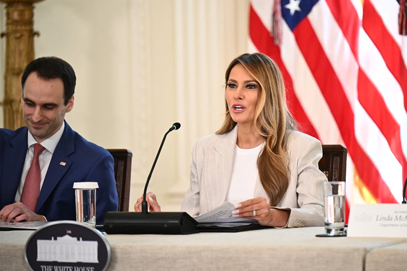 US First Lady Melania Trump (C) speaks, alongside US Secretary of Education Linda McMahon (R) and US Director of the Office of Science and technology policy Michael Kratsios during a meeting of the White House Task Force on artificial intelligence education in the East Room of the White House in Washington, DC, on September 4, 2025. (Photo by Alex WROBLEWSKI / AFP) (Photo by ALEX WROBLEWSKI/AFP via Getty Images)